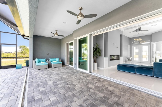 14344 Amestoy Ave, Port Charlotte, FL 33981 - view of patio featuring outdoor lounge area, french doors, a lanai, and ceiling fan