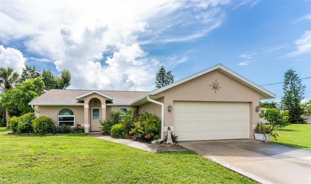 ranch-style house featuring a front yard and a garage