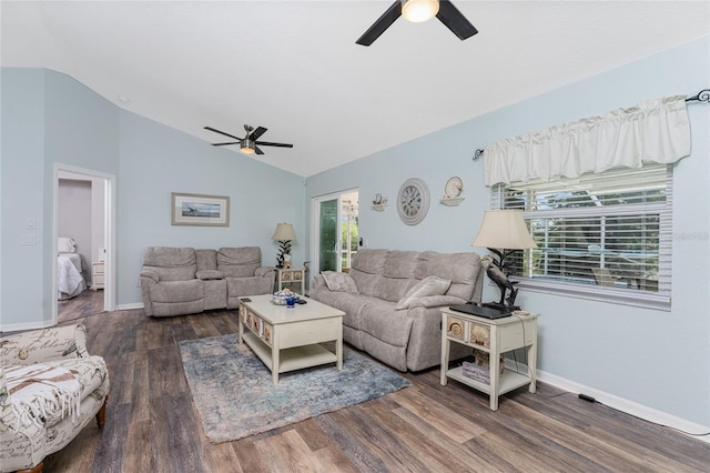 living room featuring ceiling fan, lofted ceiling, and dark hardwood / wood-style flooring