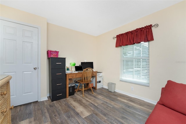 office with dark hardwood / wood-style floors