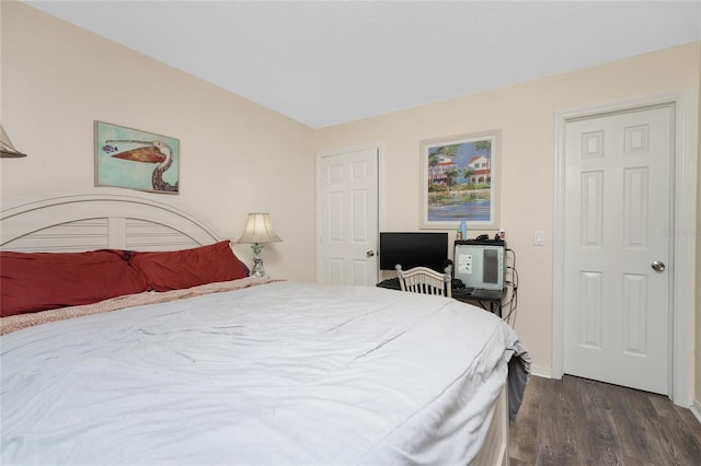 bedroom featuring dark hardwood / wood-style floors