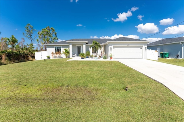 single story home featuring a garage and a front lawn