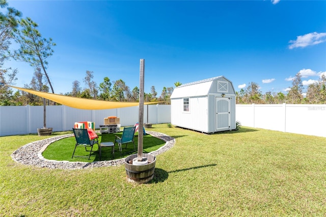 view of yard featuring a patio and a storage shed