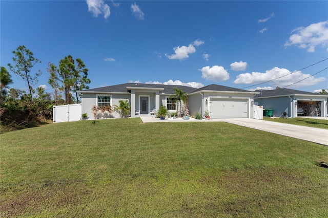 view of front facade with a front lawn and a garage