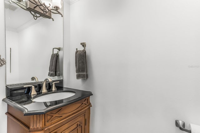 bathroom featuring vanity and crown molding