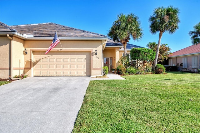 ranch-style house with a front lawn and a garage