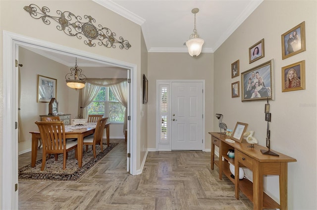 entryway with ornamental molding and parquet floors