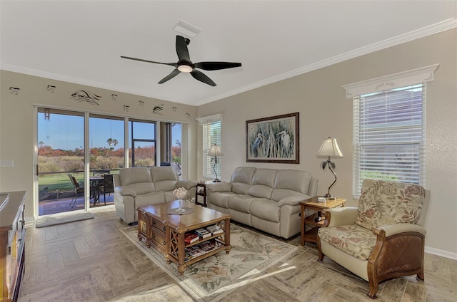 living room featuring ornamental molding, light parquet flooring, and ceiling fan