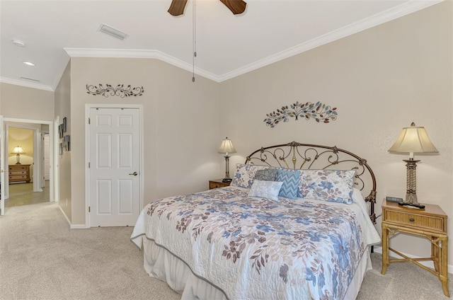 bedroom with light carpet, ornamental molding, vaulted ceiling, and ceiling fan