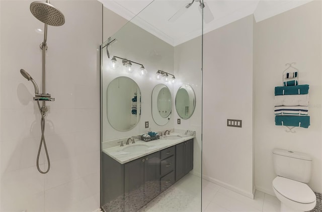 bathroom with walk in shower, toilet, vanity, crown molding, and tile patterned flooring