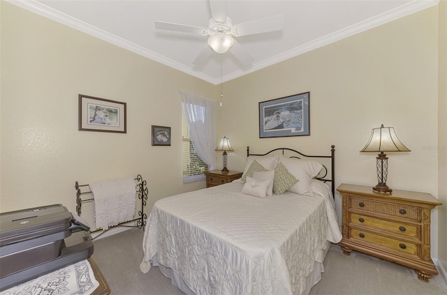 carpeted bedroom featuring crown molding and ceiling fan