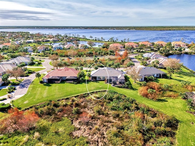 drone / aerial view featuring a water view