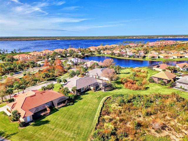 drone / aerial view featuring a water view