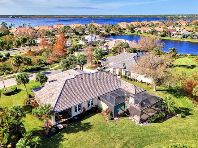 birds eye view of property featuring a water view