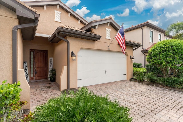 view of front of home with a garage