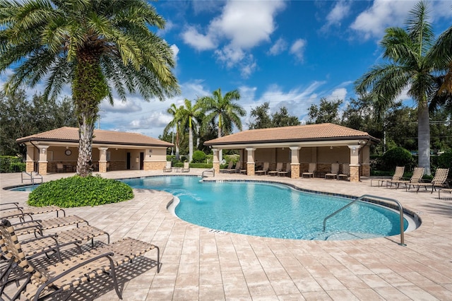 view of swimming pool with a patio area