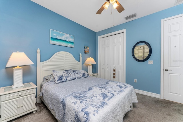 bedroom with ceiling fan, a closet, and carpet flooring