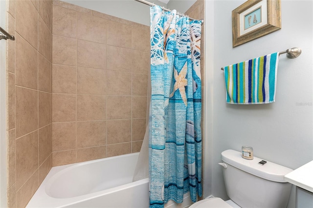 full bathroom with vanity, toilet, and shower / bath combo with shower curtain