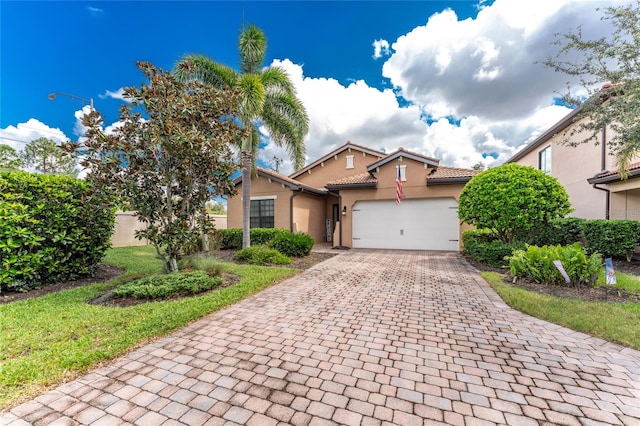 view of front of home with a garage