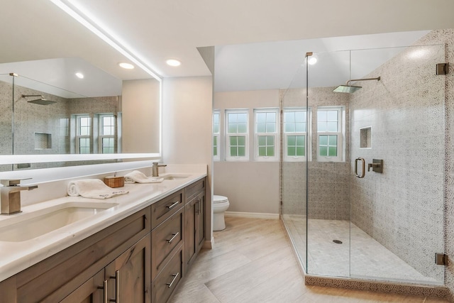 22 Seawatch Dr, Boca Grande, FL 33921 - bathroom with a shower stall, double vanity, and recessed lighting