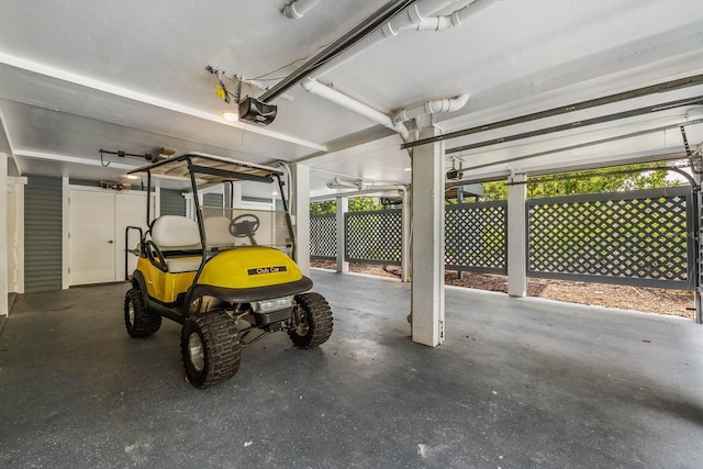 garage featuring a garage door opener