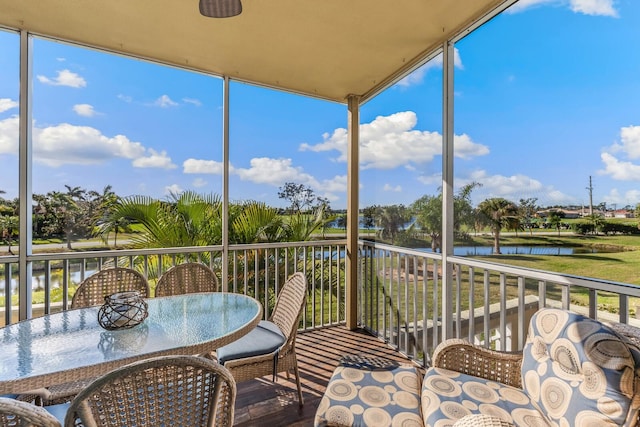 sunroom with a water view