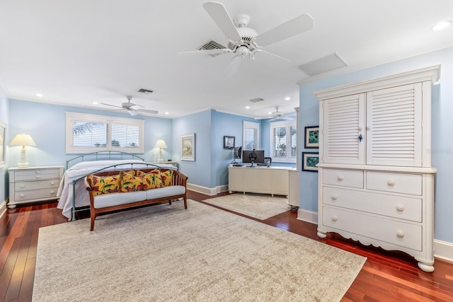 bedroom featuring ceiling fan, crown molding, and dark hardwood / wood-style floors