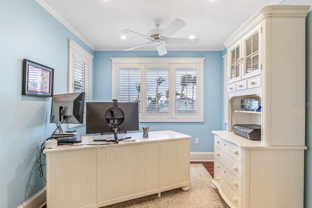 home office featuring ceiling fan, hardwood / wood-style flooring, and ornamental molding