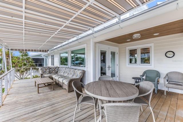 wooden deck featuring outdoor lounge area