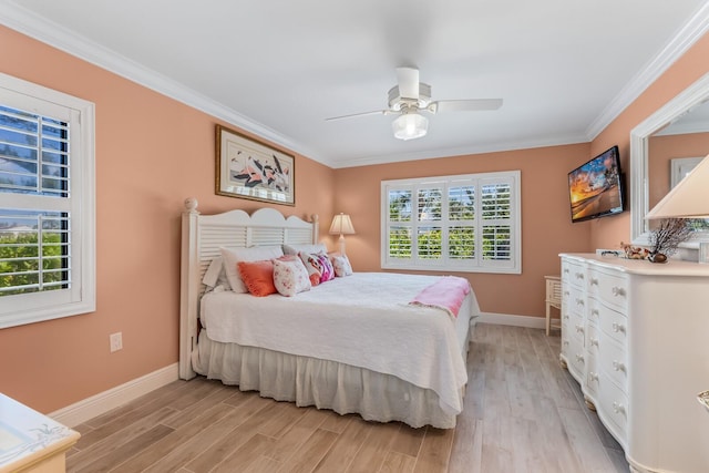 bedroom with ceiling fan, light hardwood / wood-style flooring, and ornamental molding