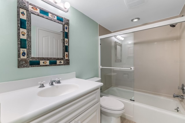 full bathroom with toilet, combined bath / shower with glass door, and vanity