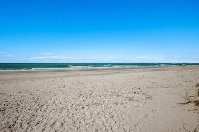 property view of water with a beach view