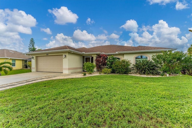 view of front facade with a front yard and a garage