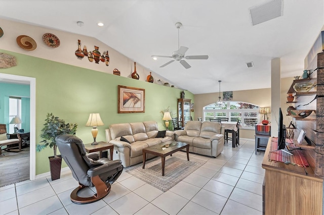 living room featuring high vaulted ceiling, light tile patterned floors, and ceiling fan