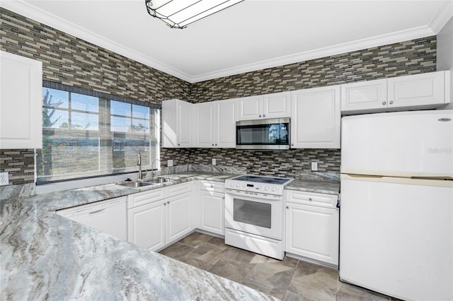 kitchen featuring white cabinets, white appliances, and sink