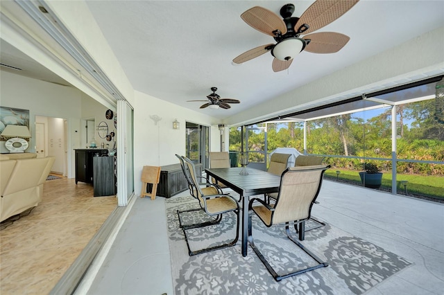 sunroom / solarium with ceiling fan