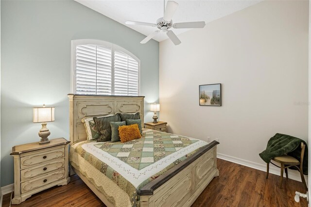 bedroom with dark wood-type flooring and ceiling fan