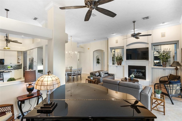 dining room featuring ornamental molding, a notable chandelier, and a textured ceiling