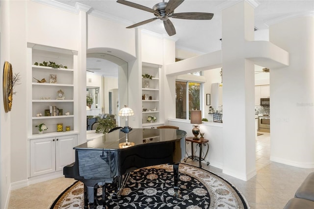 tiled home office featuring ornamental molding, built in features, and ceiling fan