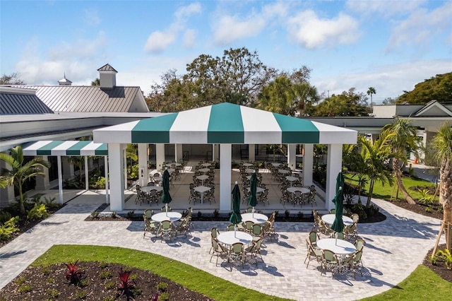 back of house with a patio