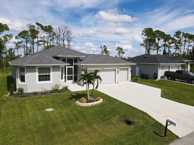 ranch-style house featuring a garage and a front yard