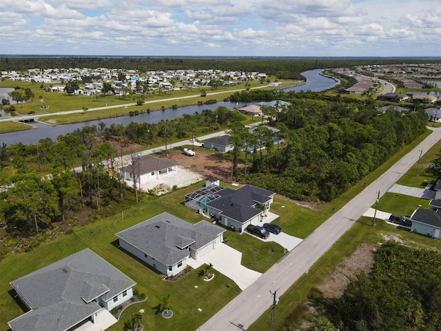 bird's eye view with a water view