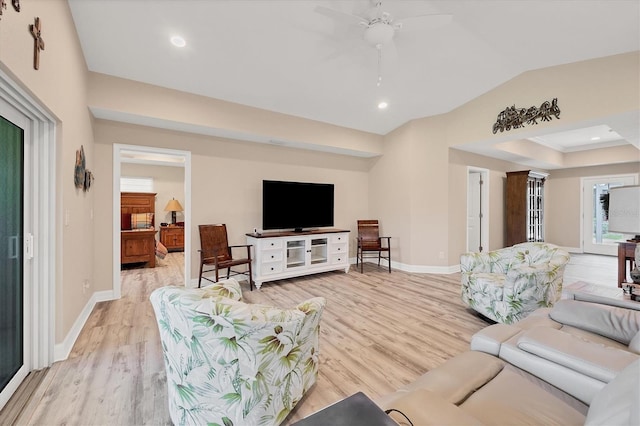 living room with ceiling fan and light hardwood / wood-style floors