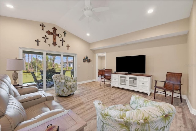 living room featuring high vaulted ceiling, light hardwood / wood-style flooring, and ceiling fan