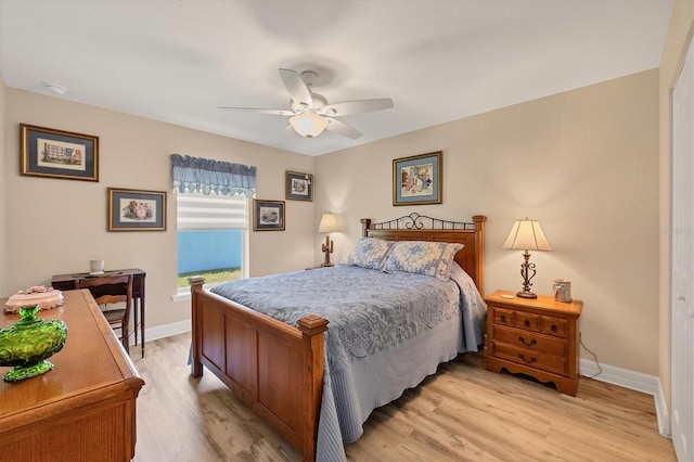 bedroom featuring ceiling fan and light hardwood / wood-style flooring