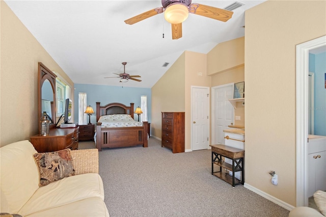 bedroom with light carpet, vaulted ceiling, visible vents, and baseboards