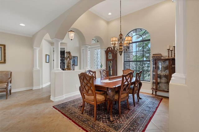 dining room featuring a high ceiling, light tile patterned floors, a healthy amount of sunlight, and an inviting chandelier