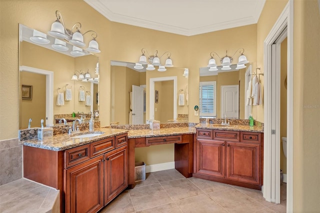 bathroom featuring crown molding, tile patterned floors, vanity, and toilet