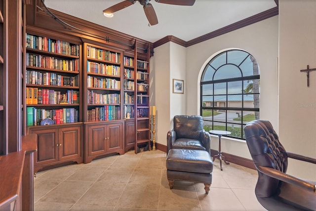 office with crown molding, ceiling fan, and light tile patterned floors