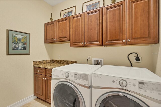 2517 Rio Grande Dr, Punta Gorda, FL 33950 - washroom featuring cabinet space, washer and clothes dryer, and baseboards